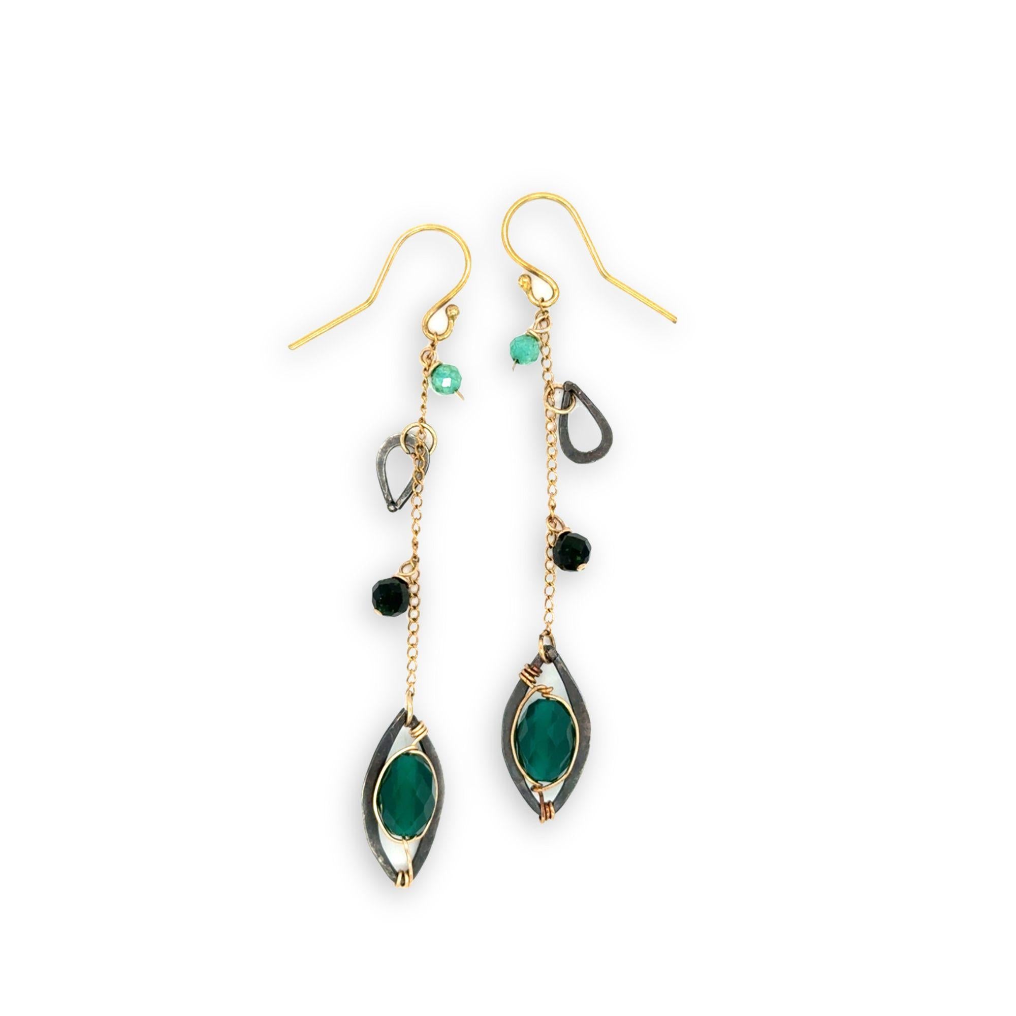 bright green cubic zirconia, green onyx, and dark green goldstone gemstones, oxidized sterling silver hammered charms adorn darkened gold fill delicate chain earrings