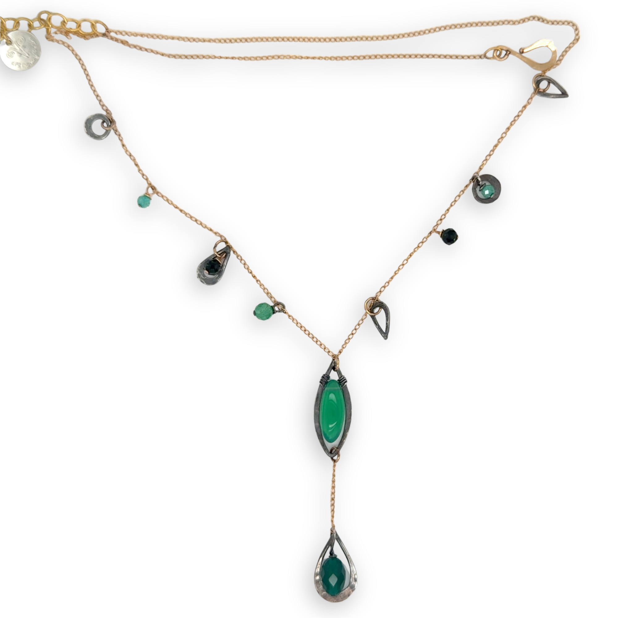 Green onyx, green goldstone, and green cubic zirconia gemstones accent a gold filled delicate chain with oxidized sterling silver charms necklace