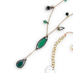 Green onyx, green goldstone, and green cubic zirconia gemstones accent a gold filled delicate chain with oxidized sterling silver charms necklace