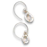 Opal gemstone nuggets dangle within a mini sterling silver hammered oval, hanging from our handmade braided sterling silver earring hoops