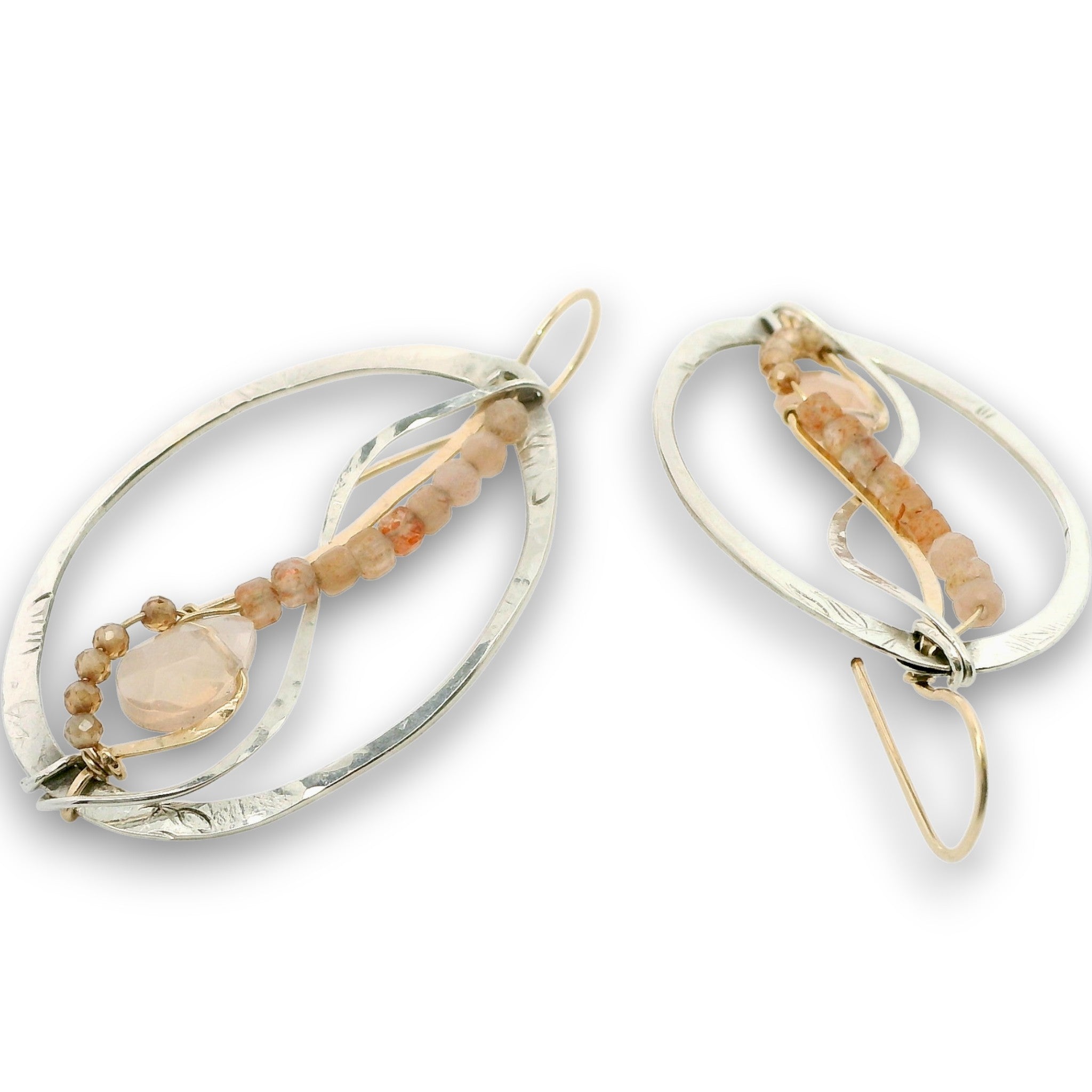 Sterling silver oval earrings stamped with florals, with pink opal mini drop gemstones, sunstone cubes, and cubic zirconia gemstones on gold filled earring hooks