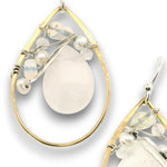 Brass teardrop shaped earrings embellished with white jade, moonstone, fresh water pearls, and opal gemstones on hammered sterling silver wire