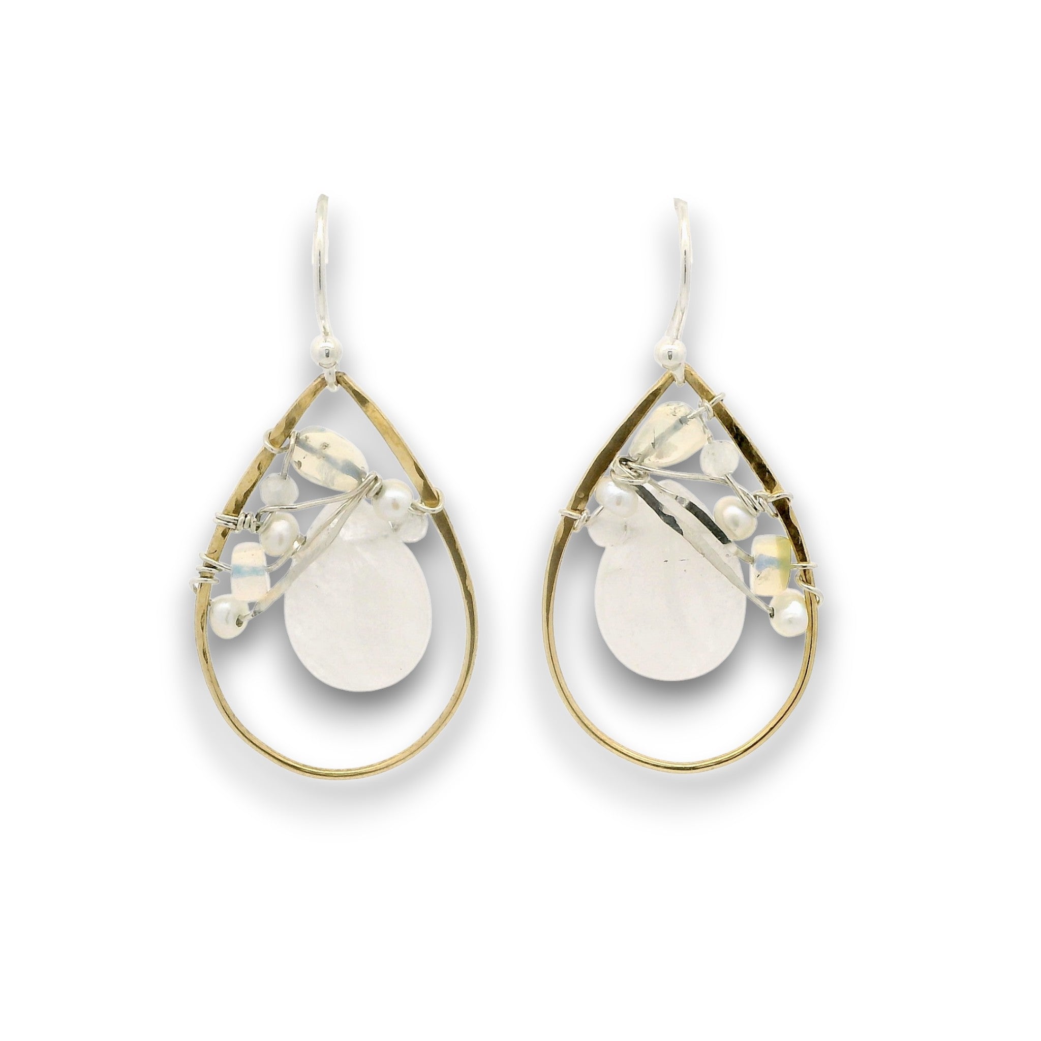 Brass teardrop shaped earrings embellished with white jade, moonstone, fresh water pearls, and opal gemstones on hammered sterling silver wire