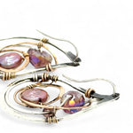 Tree stamped sterling silver oxidized paisley shaped earrings with bronze hammered twists, pink fresh water pearl coins and magenta crystals with built in earring hooks that wear like a post earring