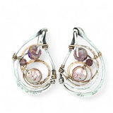 Tree stamped sterling silver oxidized paisley shaped earrings with bronze hammered twists, pink fresh water pearl coins and magenta crystals with built in earring hooks that wear like a post earring