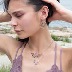 Tree stamped sterling silver oxidized paisley shaped earrings with bronze hammered twists, pink fresh water pearl coins and magenta crystals with built in earring hooks that wear like a post earring