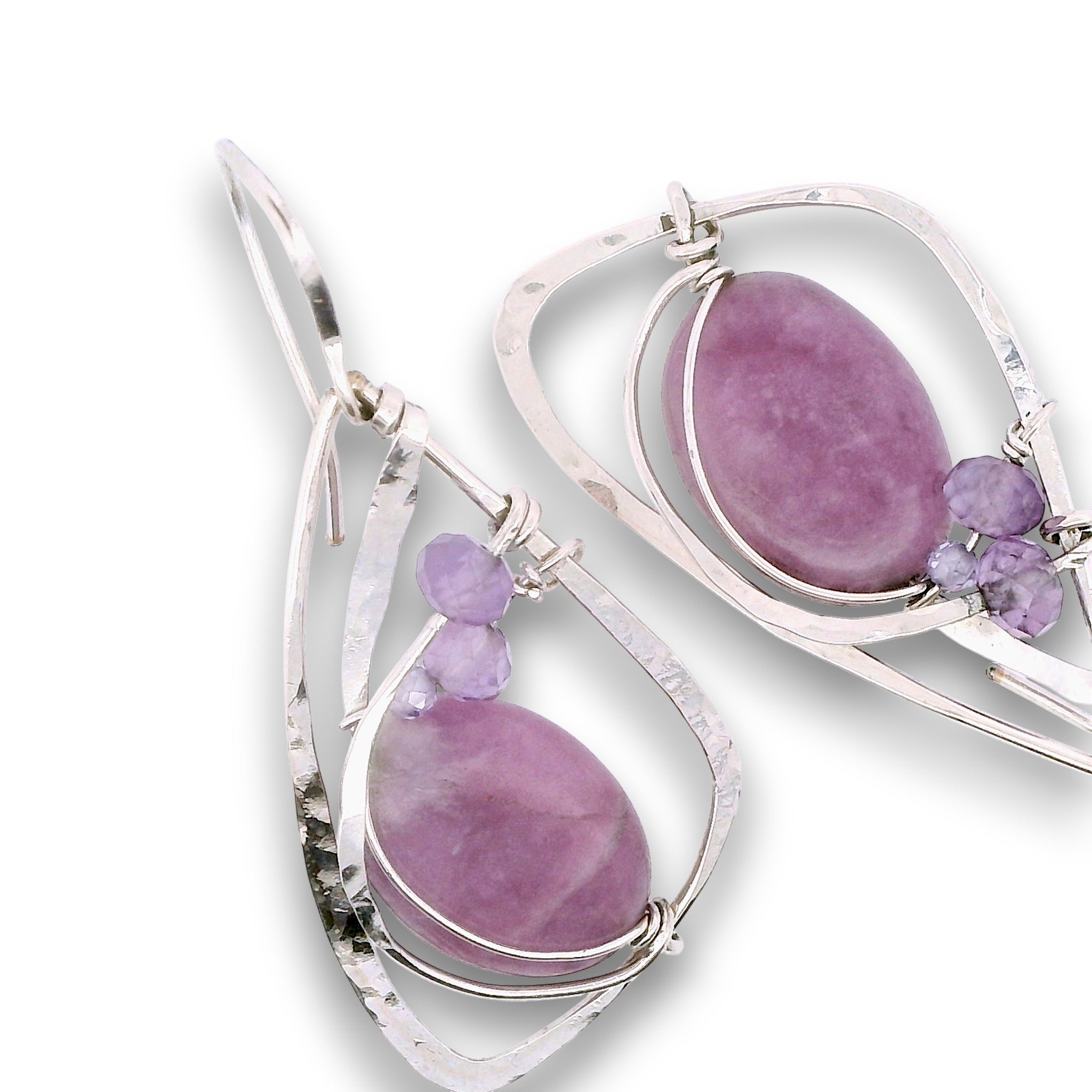 Sterling silver hammered wing shaped earrings with sugilite smooth ovals, lavender cubic zirconia, and amethyst gemstones