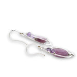 Sterling silver hammered wing shaped earrings with sugilite smooth ovals, lavender cubic zirconia, and amethyst gemstones