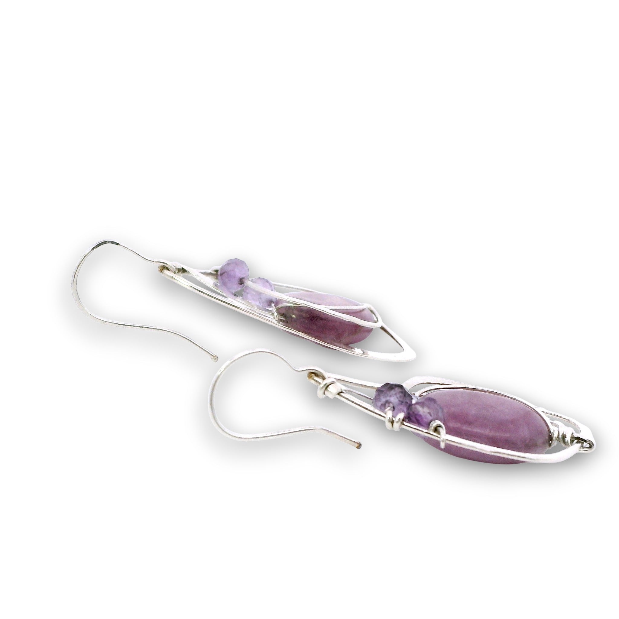 Sterling silver hammered wing shaped earrings with sugilite smooth ovals, lavender cubic zirconia, and amethyst gemstones