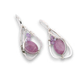 Sterling silver hammered wing shaped earrings with sugilite smooth ovals, lavender cubic zirconia, and amethyst gemstones