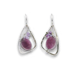 Sterling silver hammered wing shaped earrings with sugilite smooth ovals, lavender cubic zirconia, and amethyst gemstones