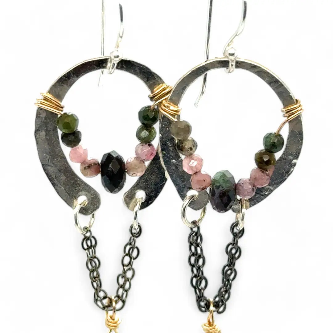 A pair of dark sterling silver mini open hoop earrings with tourmaline and new jade mini drop gemstones, featuring a oxidized sterling silver delicate chain