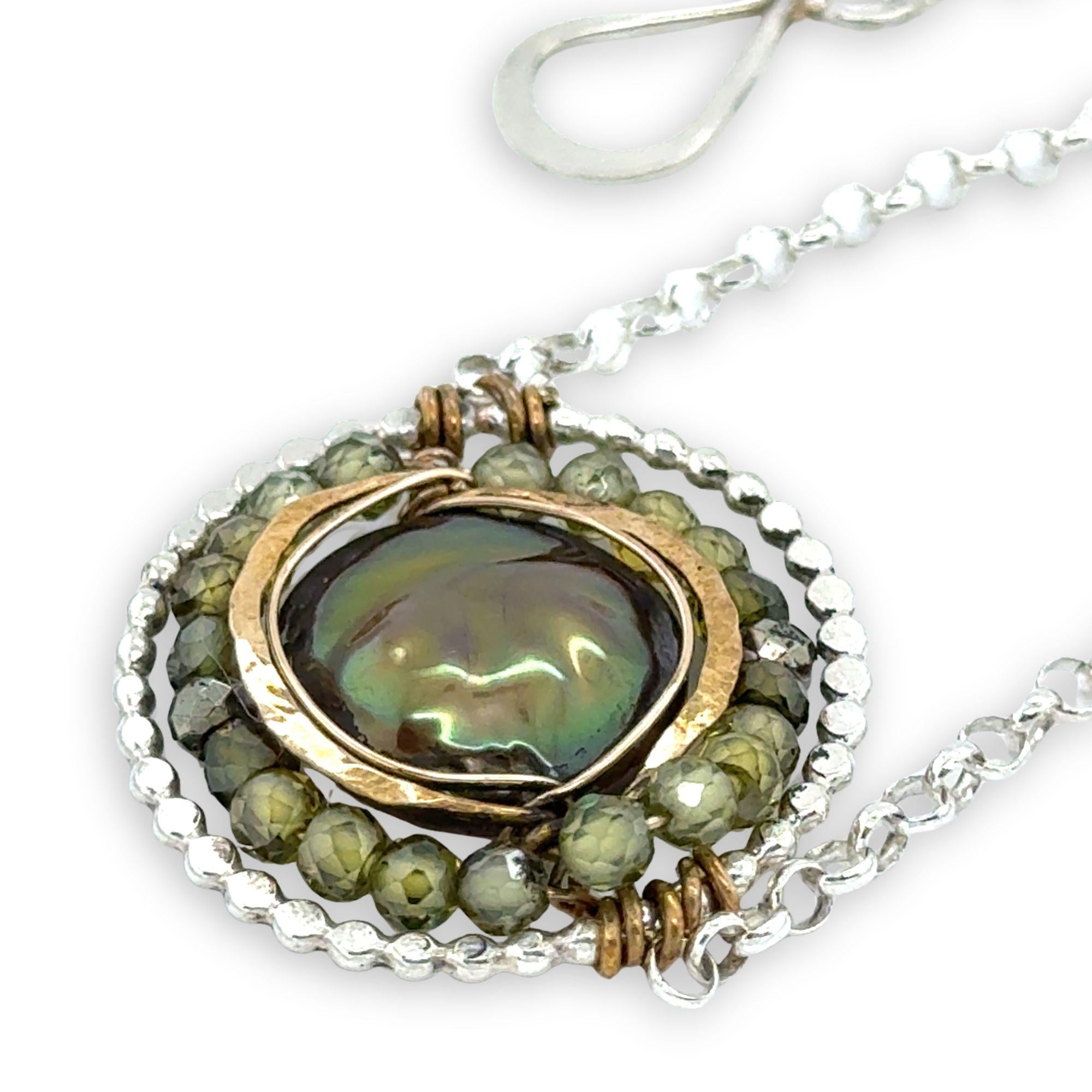 sterling silver dot wire ring pendant with olive green fresh water pearl coin surrounded by hammered brass and green cubic zirconia and pyrite necklace