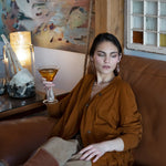 A pair of lightweight sterling silver marquise frame earrings, featuring faceted mookite jasper , hessonite gemstones, and a rich red fresh water pearl drop.