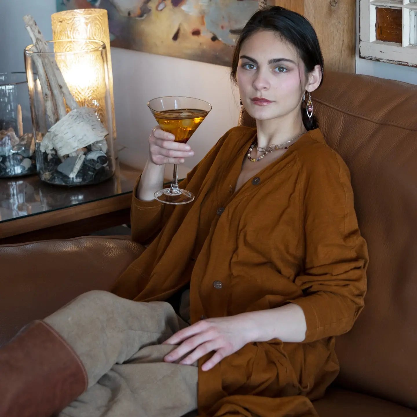 A pair of lightweight sterling silver marquise frame earrings, featuring faceted mookite jasper , hessonite gemstones, and a rich red fresh water pearl drop.
