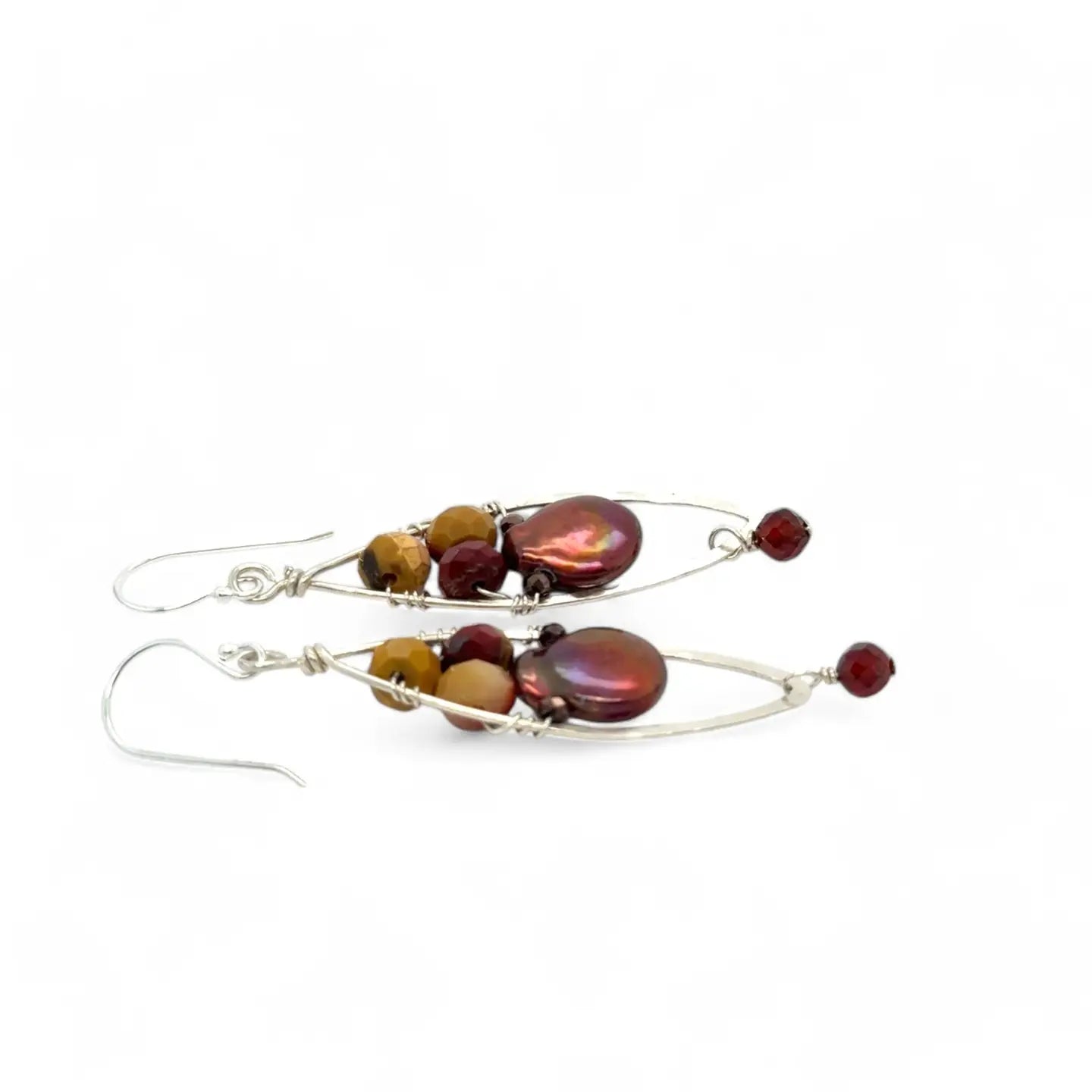 A pair of lightweight sterling silver marquise frame earrings, featuring faceted mookite jasper , hessonite gemstones, and a rich red fresh water pearl drop.