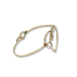 Hammered brass heart bracelet with a singular round fresh water pearl accent