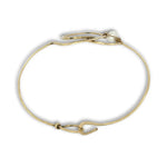 Hammered brass heart bracelet with a singular round fresh water pearl accent