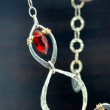 Darkened sterling silver marquise link necklace with refined quality garnet marquise gemstones on gold filled wire