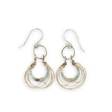 Sterling silver handmade mini earrings woven with gold filled wire hanging from a braided gold filled link