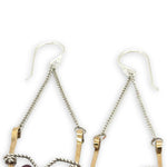 hammered brass points hanging from delicate sterling silver chain with oxidized sterling silver twist and faceted garnet gemstones earrings