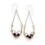 hammered brass points hanging from delicate sterling silver chain with oxidized sterling silver twist and faceted garnet gemstones earrings