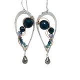 A pair of sterling silver drop earrings with gold-filled wiring and dark green faceted bloodstone and blue tourmaline gemstones with silver pyrite drops.