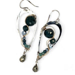 A pair of sterling silver drop earrings with gold-filled wiring and dark green faceted bloodstone and blue tourmaline gemstones with silver pyrite drops.