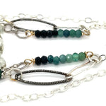 A sterling silver double chain necklace with adjuster, featuring dark green fresh water pearl, dark green amethyst drop, faceted blue tourmaline ombre gemstones, green amethyst, and oxidized sterling silver diamond cut links 