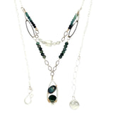 A sterling silver double chain necklace with adjuster, featuring dark green fresh water pearl, dark green amethyst drop, faceted blue tourmaline ombre gemstones, green amethyst, and oxidized sterling silver diamond cut links 