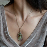 Sterling silver drop necklace with round faceted prehnite gemstone, accented with watermelon tourmaline. Oxidized sterling silver and gold-filled delicate double chain