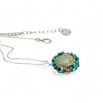  prehnite nugget wrapped in bronze hammered wire and turquoise gemstones inside a sterling silver geometric mini pendant necklace