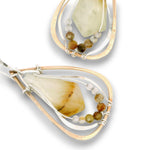 Teardrop shaped bronze earrings with serpentine jade diamond gemstones with rutilated quartz and green garnet accents on sterling silver wire