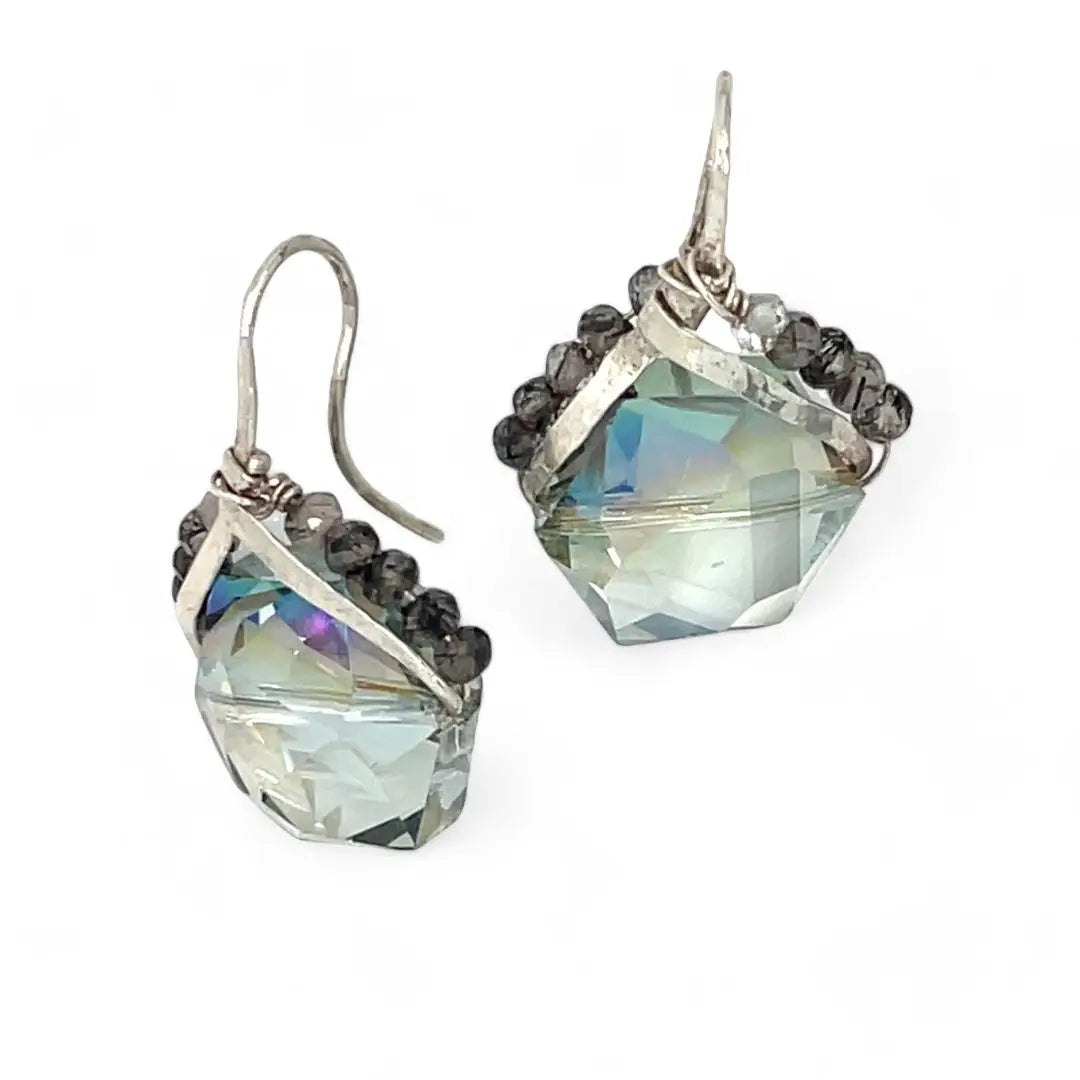 A pair of mini sparkly mint colored hexagon pcrystal earrings with handmade sterling silver tops and black tourmalinated faceted quartz gemstones, designed with built-in sterling silver hooks to wear like a post earring