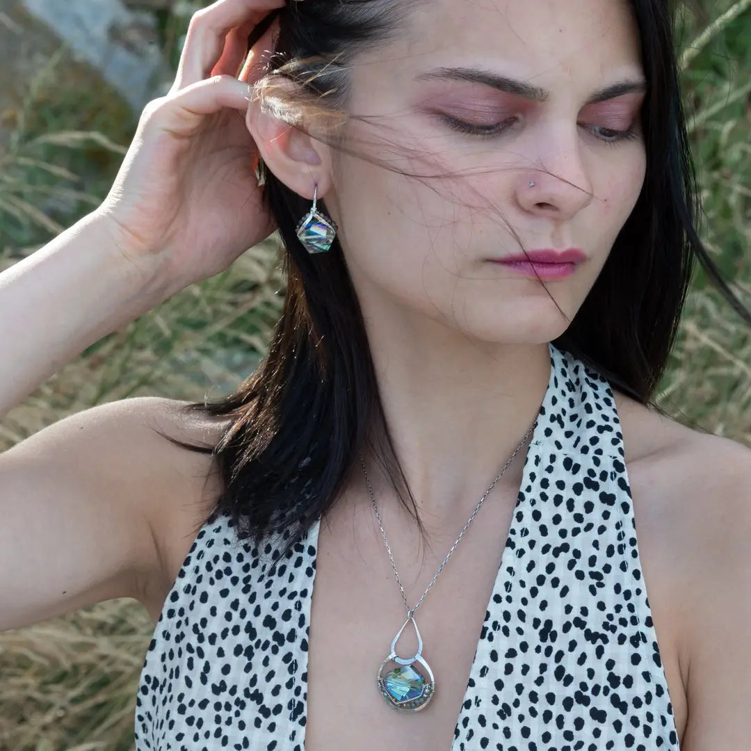 A pair of mini sparkly mint colored hexagon pcrystal earrings with handmade sterling silver tops and black tourmalinated faceted quartz gemstones, designed with built-in sterling silver hooks to wear like a post earring