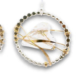 Sterling silver dot hoops with clear faceted heart shaped crystals held in wraps of hammered 14k gold filled wire