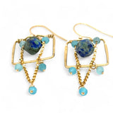 A pair of brass puzzle box earrings  featuring aqua blue cat's eye, azurite gemstones, and a gold-filled rolo chain.