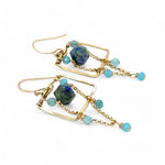 A pair of brass puzzle box earrings  featuring aqua blue cat's eye, azurite gemstones, and a gold-filled rolo chain.
