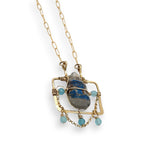 Brass puzzle box mini necklace with an azurite drop accented with blue cat's eye gemstones and delicate gold filled rolo chain