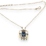 Brass puzzle box mini necklace with an azurite drop accented with blue cat's eye gemstones and delicate gold filled rolo chain