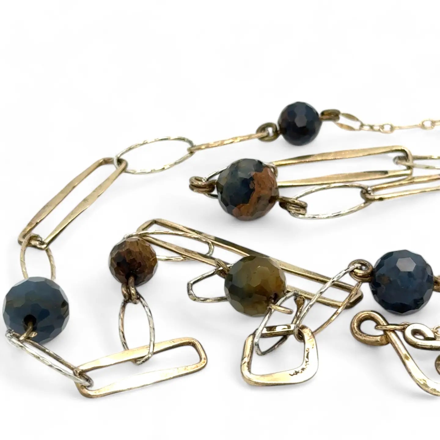 Long handmade brass link and gold filled necklace interspersed with cat's eye faceted gemstones 