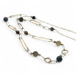 Long handmade brass link and gold filled necklace interspersed with cat's eye faceted gemstones 