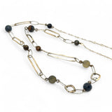 Long handmade brass link and gold filled necklace interspersed with cat's eye faceted gemstones 