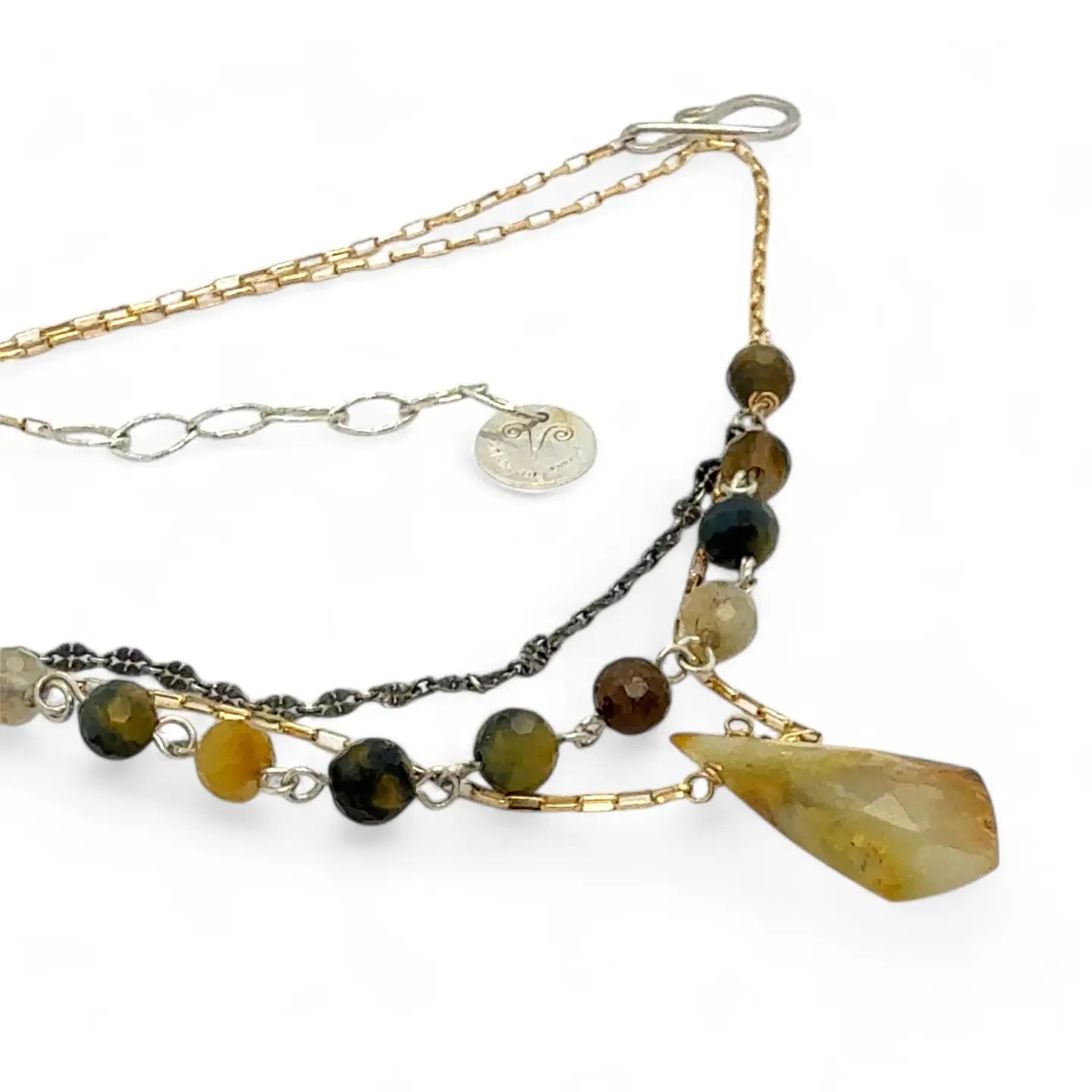 Green yellow jade long diamond hangs from gold filled box chain, with a layer of cat's eye gemstones, and a layer of oxidized sterling silver chain necklace