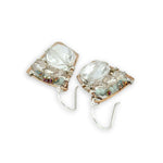 Quartz ovals surrounded by pyrite and crystal gemstones on sterling silver wire within a bronze parallelogram shape earrings