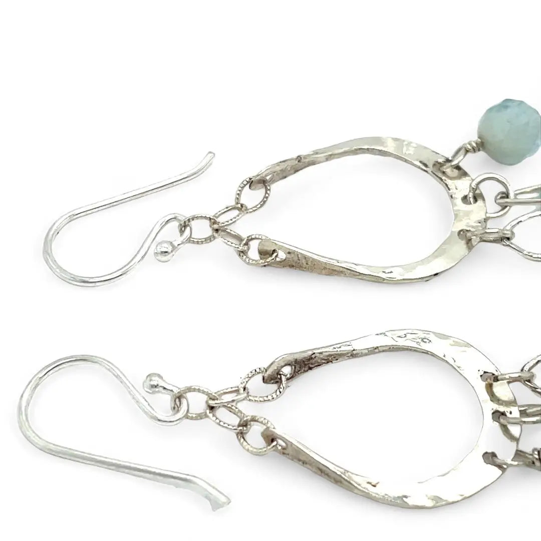 Blue quartz and aquamarine gemstones cascade from sparkly sterling silver cloud earrings