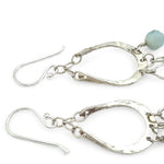 Blue quartz and aquamarine gemstones cascade from sparkly sterling silver cloud earrings