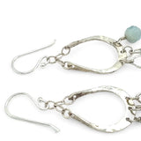 Blue quartz and aquamarine gemstones cascade from sparkly sterling silver cloud earrings