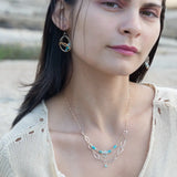 A handmade hammered sterling silver link double chain necklace with gold filled delicate chain, turquoise, blue quartz, and opal gemstones