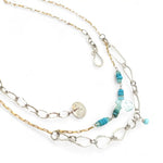 A handmade hammered sterling silver link double chain necklace with gold filled delicate chain, turquoise, blue quartz, and opal gemstones